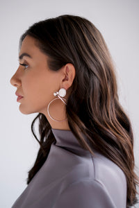 Swing hoop earrings with white opal