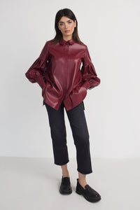 Vegan leather shirt with pleated balloon sleeves in maroon