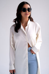 Oversized silk long collarless shirt with high pocket in white