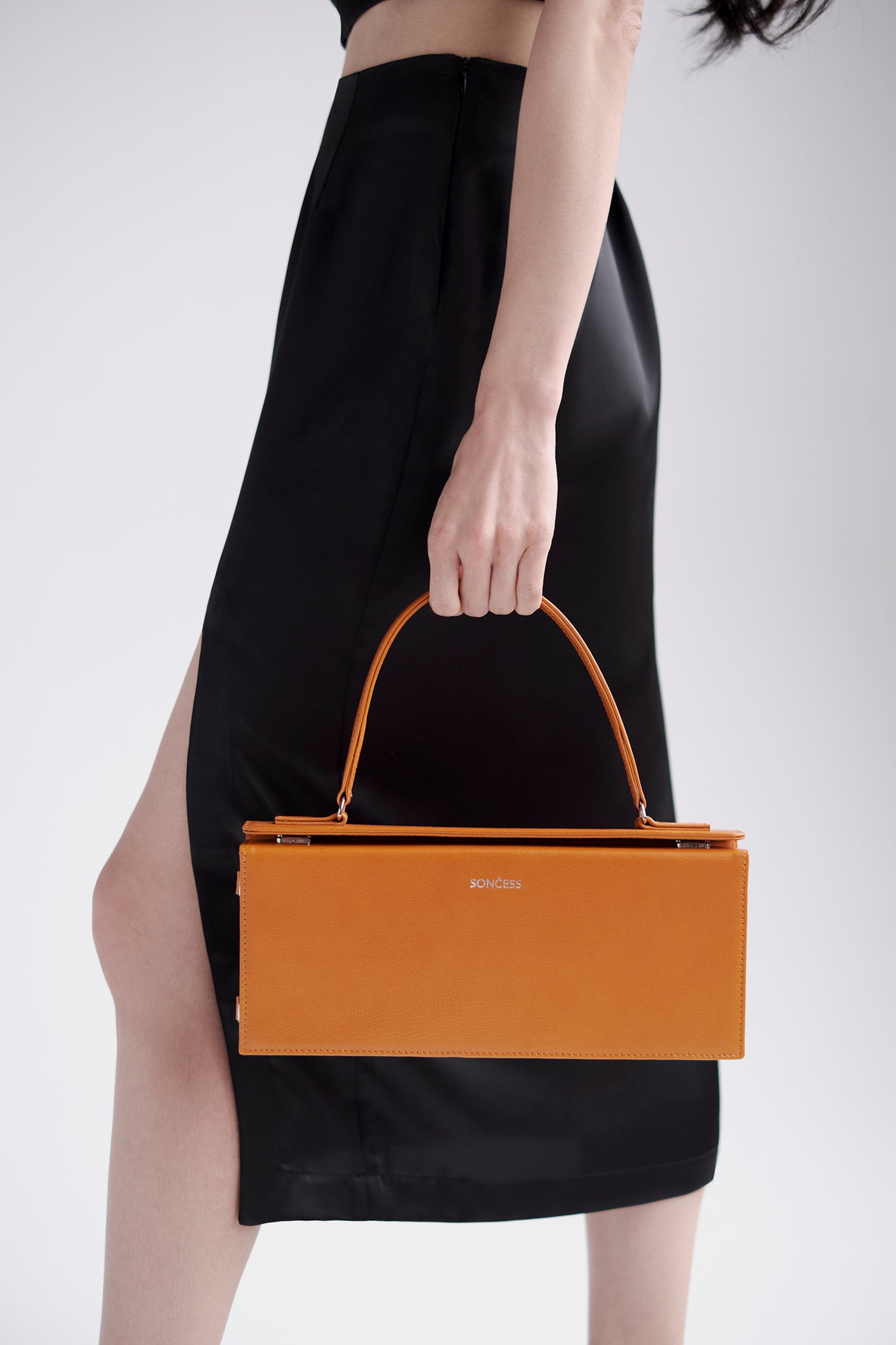 Silk skirt with front slit in black