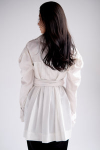 Belted shirt with puff sleeves and asymmetric hem in white